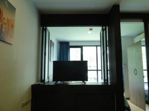 A television and/or entertainment centre at Apartment near Central phuket