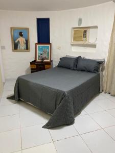Vuode tai vuoteita majoituspaikassa CASA DE REVISTA em Cabo Frio