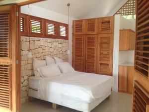 Ένα ή περισσότερα κρεβάτια σε δωμάτιο στο Casa 01