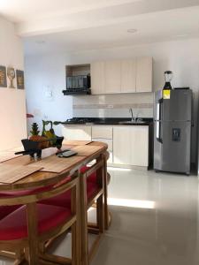 Nhà bếp/bếp nhỏ tại Hermoso Apartamento en Caribe Campestre