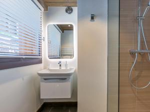 a bathroom with a sink and a mirror at Appartement de standing avec balcon ensoleillé, 3 chambres, au cœur de Val-d'Isère - FR-1-694-322 in Val dʼIsère +13 photos