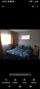Cama o camas de una habitación en Hostal Renca, Casa Hotel