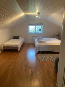 Llit o llits en una habitació de Villa Gasabäck