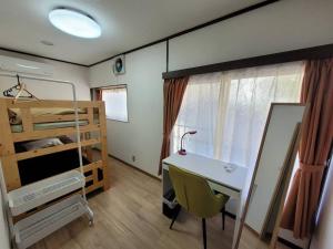 Postel nebo postele na pokoji v ubytování atami kawaneso onsen in shizuoka