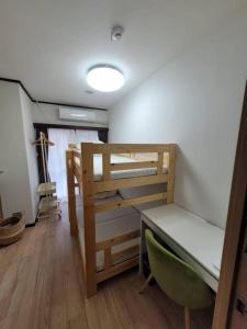 Postel nebo postele na pokoji v ubytování atami kawaneso onsen in shizuoka