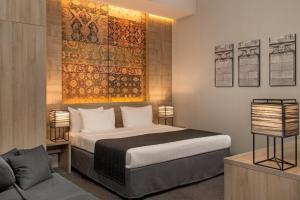 Postel nebo postele na pokoji v ubytování Republica Hotel Yerevan