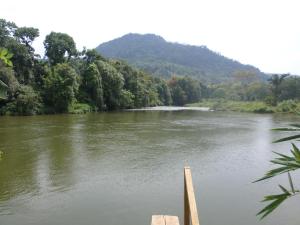 a view of a river with a mountain in the background at Comfortable Eco Stays in Kitulgala with sightseeing & Adventure activities - Back Kate Resort in Kitulgala