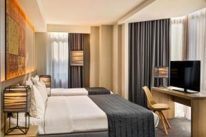 Postel nebo postele na pokoji v ubytování Republica Hotel Yerevan