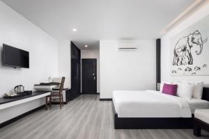 Postel nebo postele na pokoji v ubytování Apsor Palace Hotel