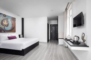 Postel nebo postele na pokoji v ubytování Apsor Palace Hotel