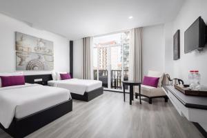 Postel nebo postele na pokoji v ubytování Apsor Palace Hotel