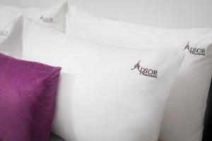 Postel nebo postele na pokoji v ubytování Apsor Palace Hotel
