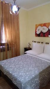 A bed or beds in a room at Casa Magini