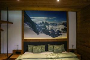 Voodi või voodid majutusasutuse Chalet Heidi toas