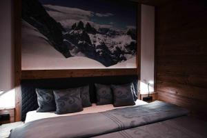 Voodi või voodid majutusasutuse Chalet Heidi toas