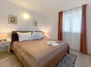 Postel nebo postele na pokoji v ubytování Apartment Villa Slavija