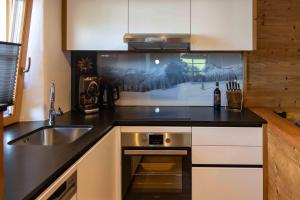Köök või kööginurk majutusasutuses Chalet Heidi