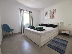 Postel nebo postele na pokoji v ubytování Apartments Silver