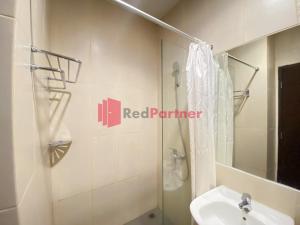 Koupelna v ubytování Hotel Alpha Makassar RedPartner + 15 fotografií