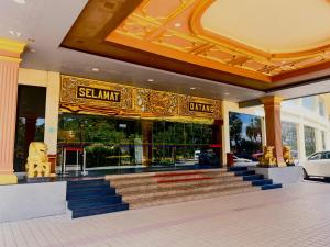 a building with stairs in front of a store at Golden View Hotel in Nagoya