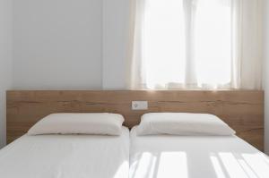 Cama o camas de una habitación en Kiko Park Oliva