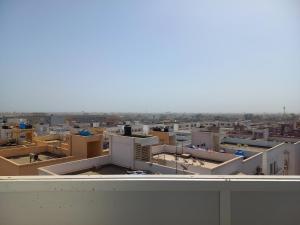 a view of a city from the roof of a building at Le Loft 32 in Dakar