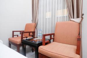 Predel za sedenje v nastanitvi Urbanview Syariah Wisma Wongso Borobudur