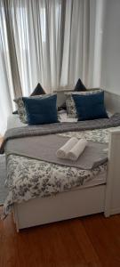 Łóżko lub łóżka w pokoju w obiekcie AnJa Apartment