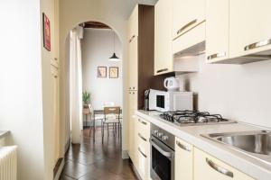 Η κουζίνα ή μικρή κουζίνα στο Apartment San Giorgio B - Lucca +7 φωτογραφίες