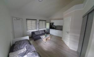 Χώρος καθιστικού στο Ferienwohnung am Stadtwald