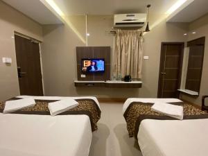 TV a/nebo společenská místnost v ubytování Hotel Sivas Regency