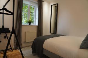 Ένα ή περισσότερα κρεβάτια σε δωμάτιο στο Spacious 5 Bed in Oxfordshire