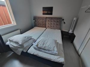 Voodi või voodid majutusasutuse Guest House Tullgatan 24 toas