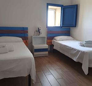A bed or beds in a room at Holiday home in Portopalo 35405