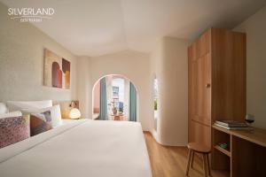 Voodi või voodid majutusasutuse Silverland Bến Thành toas