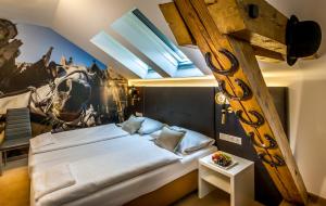 เตียงในห้องที่ BoutiqueHOTEL Donauwalzer