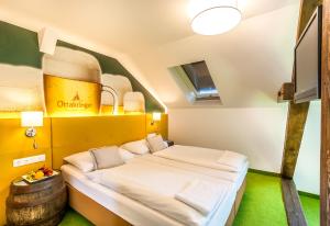 Posteľ alebo postele v izbe v ubytovaní BoutiqueHOTEL Donauwalzer
