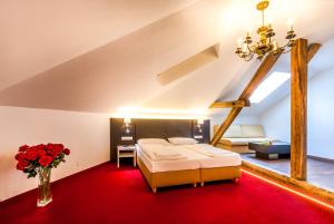 Posteľ alebo postele v izbe v ubytovaní BoutiqueHOTEL Donauwalzer