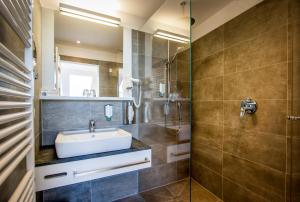 Kúpeľňa v ubytovaní BoutiqueHOTEL Donauwalzer