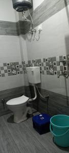 Ванная комната в RADHA BNB ( HOMESTAY )