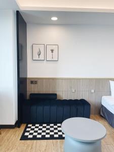 Posezení v ubytování 小隱居Hermit Dorm-聖雄商旅