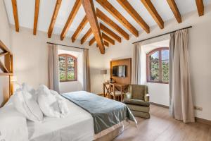 Кровать или кровати в номере Hoposa Costa D'or - Adults Only