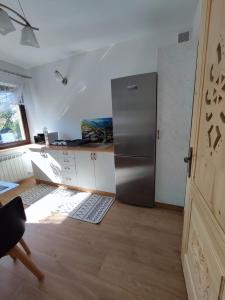 Kuchyň nebo kuchyňský kout v ubytování Pokoje u Dany Witów