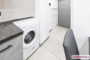 a laundry room with a washer and dryer at La Casetta agli Orefici By DomusExtra in Naples