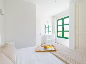 En eller flere senge i et værelse på Marina nº 280