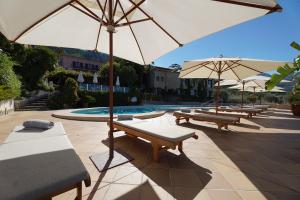 Бассейн в Hoposa Costa D'or - Adults Only или поблизости