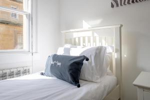 Ένα ή περισσότερα κρεβάτια σε δωμάτιο στο Flat in Bath City Centre