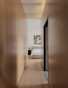Ένα ή περισσότερα κρεβάτια σε δωμάτιο στο Architect’s home pad - Valletta +2 φωτογραφίες