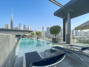 a swimming pool on the roof of a building at City Walk Chic living 1 Bedroom apartment in Dubai