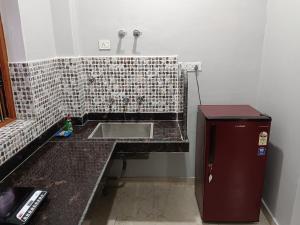 Kuchyň nebo kuchyňský kout v ubytování Happy Homes
